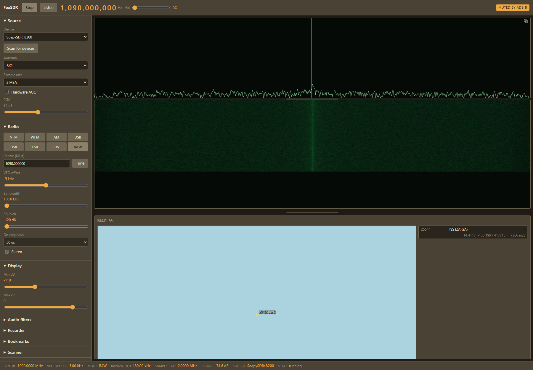 The FoxSDR interface running in a web browser, in the same brass and olive instrument styling as the desktop application.